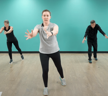 Three people in an exercise class