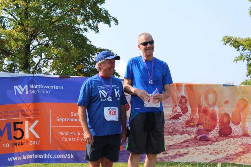 Two people at a running event