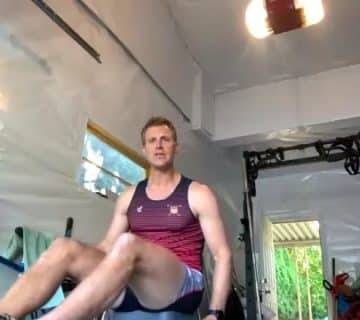 A man on a rowing machine